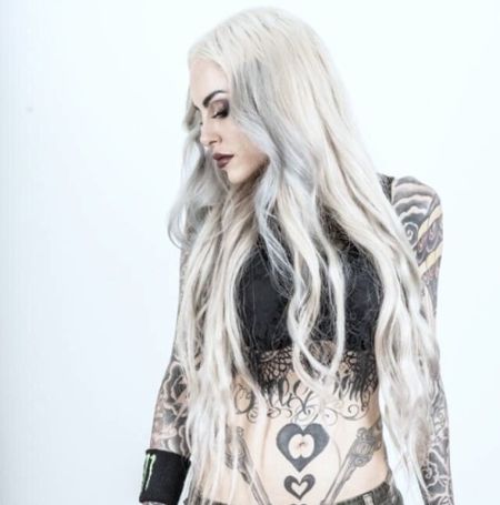 The 37 years old musician, Alecia Mixi Demner, rose to fame as a metal vocalist and is considered a phenomenal hard rock artist with a deep voice.